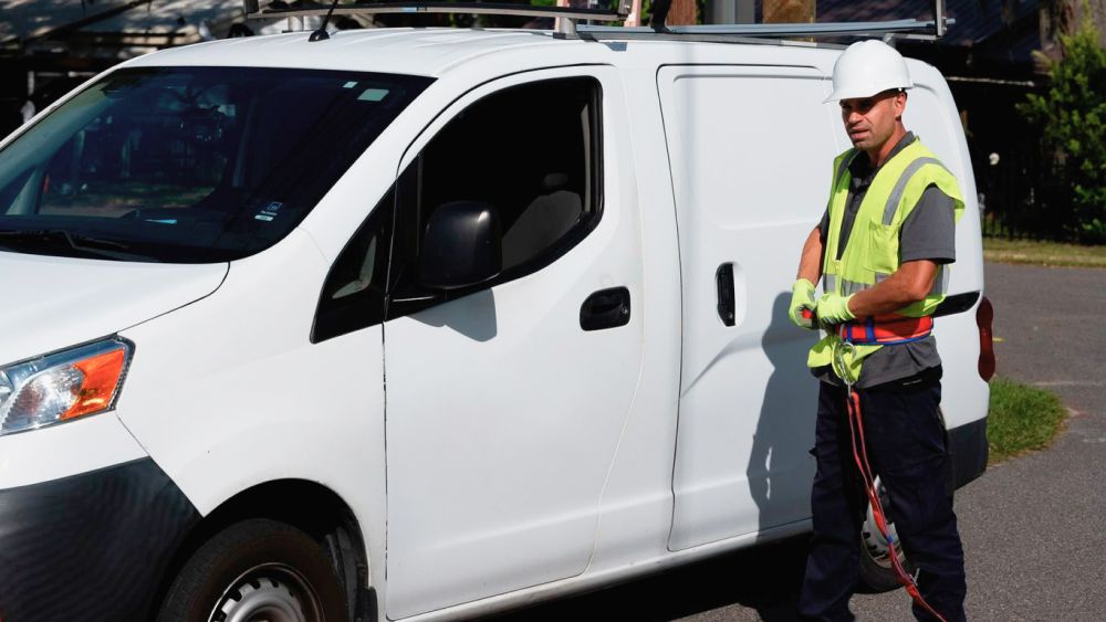 Cable Technician Near a Van